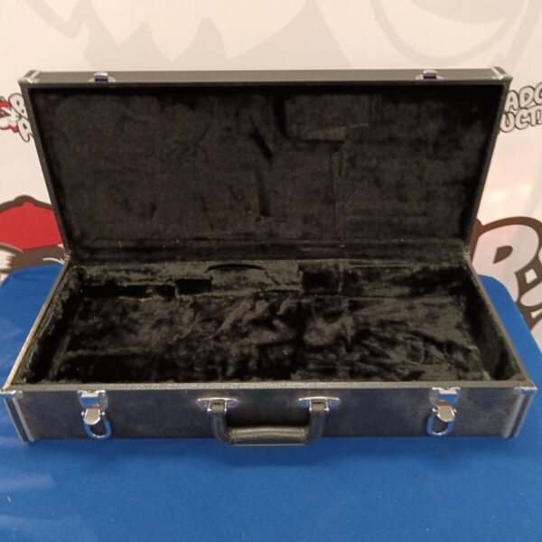 Black hard shell musical instrument case with latches.