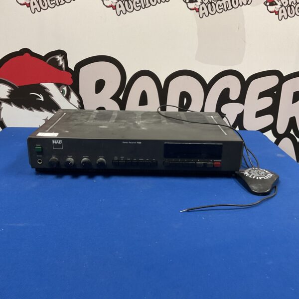 Vintage NAD 7125 stereo receiver with antenna multiplier, front view.