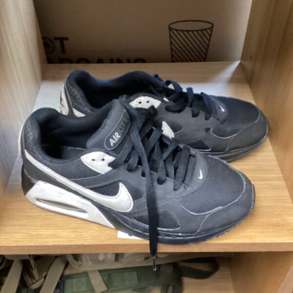 Size 5 Nike Air Max trainers showing wear.