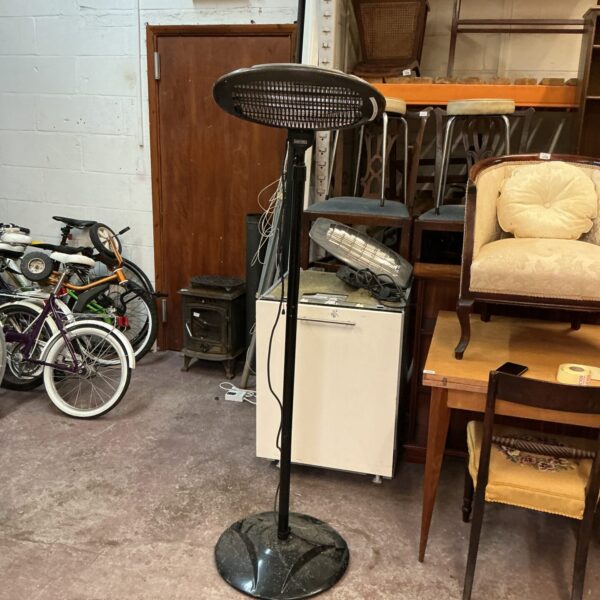 Black Olson Smith electric patio heater for outdoor garden use.