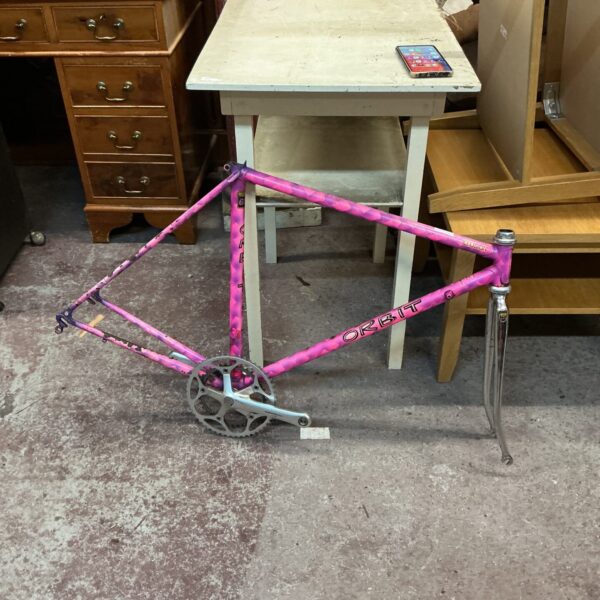 Pink vintage Orbit bike frame for restoration project.