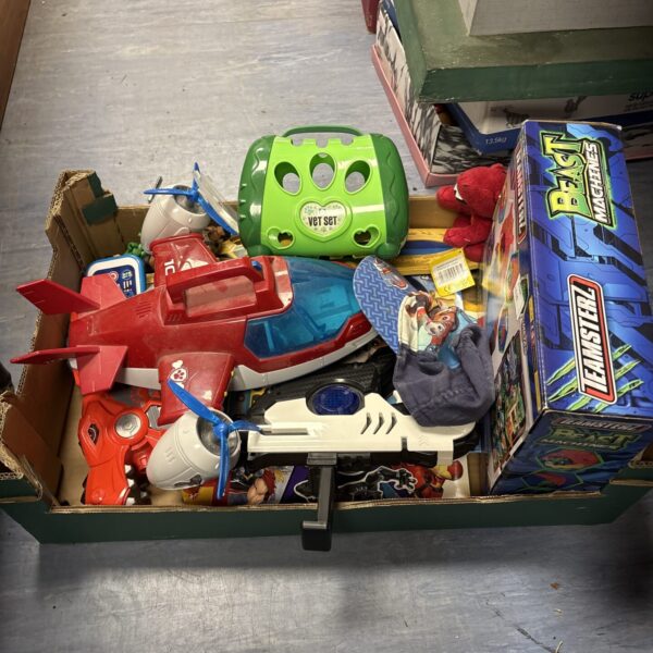 Paw Patrol vehicle and toy bundle for children's play.