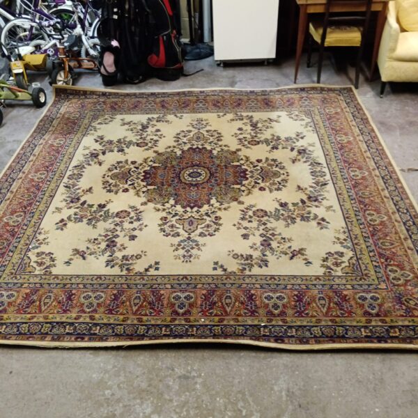 Full view of a floral Persian rug by Woodward Grosvenor.