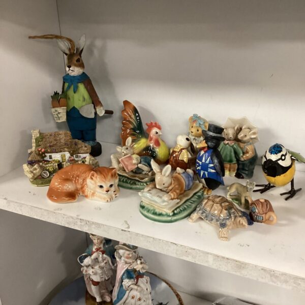 Charming Peter Rabbit ornament collection with vintage figurines.