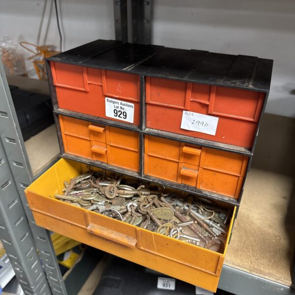 Front view of a plastic organiser unit with multiple drawers.