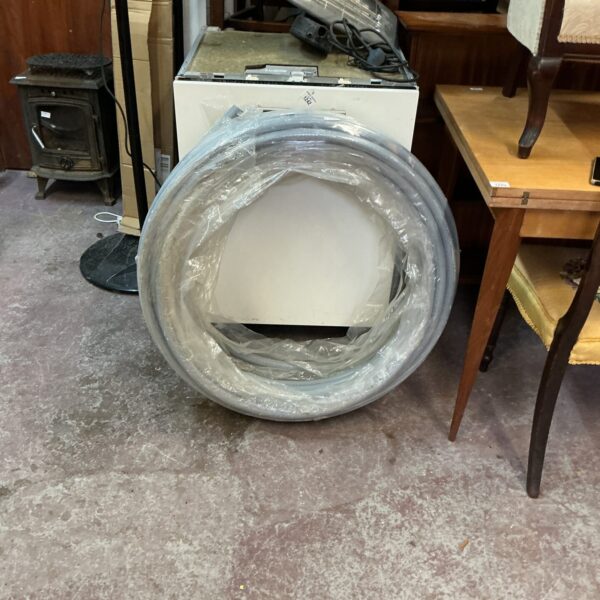 Roll of plastic water pipe for plumbing and irrigation.