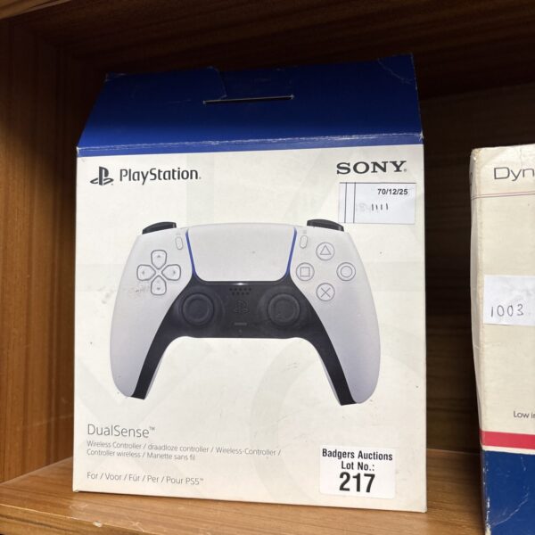 Front view of a used Sony PlayStation 5 DualSense controller.