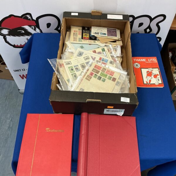 Vintage postage stamp collection within a protective album.
