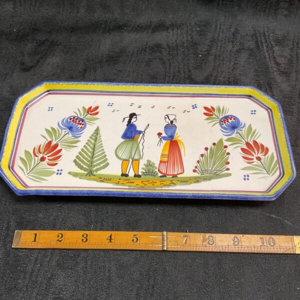 Antique French Quimper pottery sandwich plate with hand-painted Breton scene.