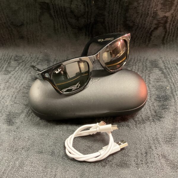 Ray Ban Meta Stories Wayfarer smart sunglasses with charging case.