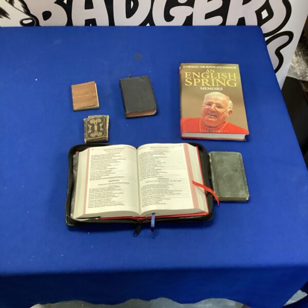 Religious ephemera lot featuring vintage books and memoirs.