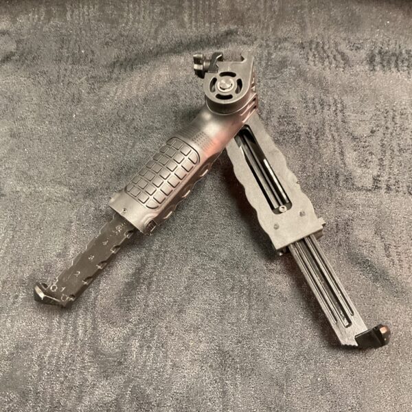 Adjustable metal rifle bipod for stable firearm support.