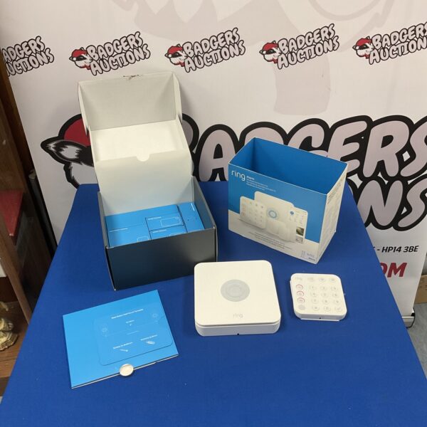 Ring Alarm system hub with packaging for wireless home security.