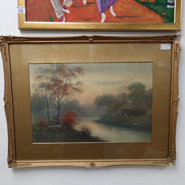 Signed watercolour painting of a riverside cottage landscape.