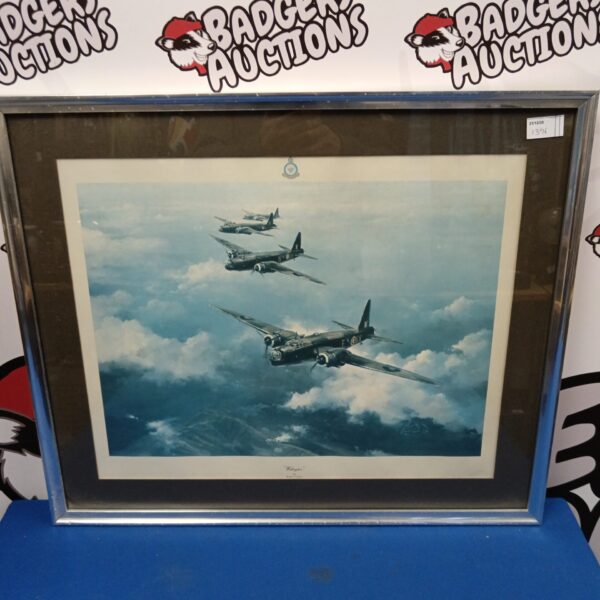 Framed Robert Taylor print of Wellington bomber aircraft in flight.