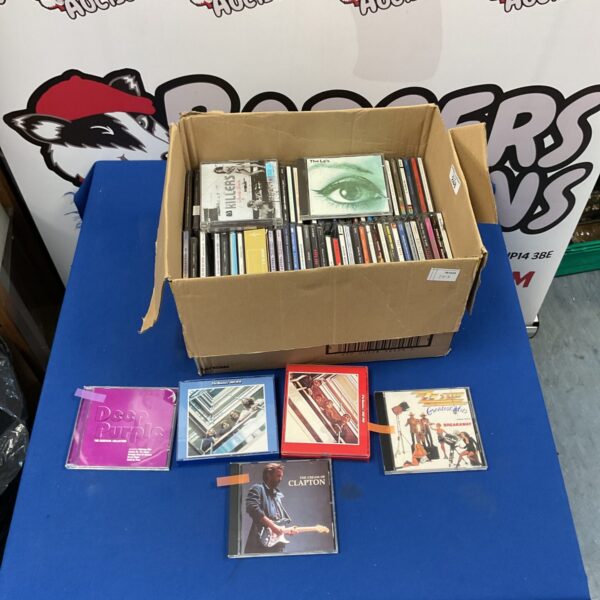 Mixed lot of rock and pop CDs including Deep Purple and Eric Clapton.