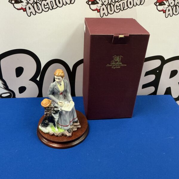 Vintage Rockingham Beatrix Potter figurine, collectible pottery.