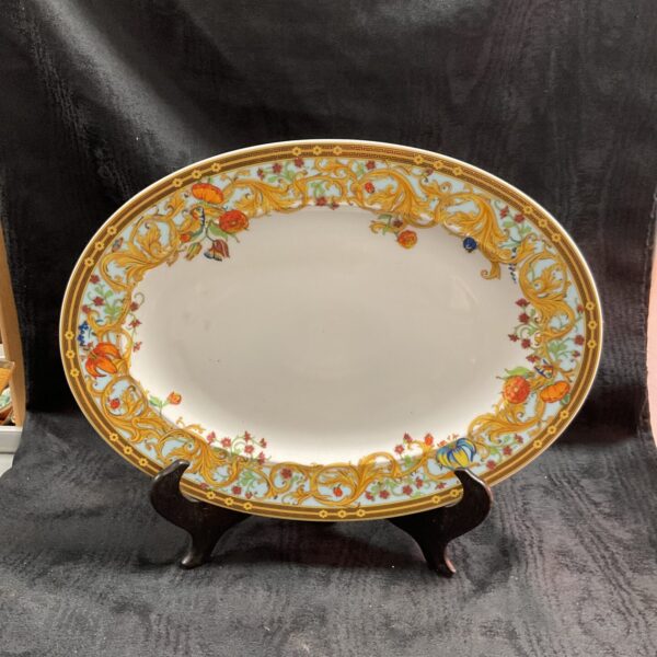 Vintage Rosenthal Studio Linie plate with floral and pumpkin design.