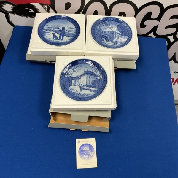 Royal Copenhagen Christmas plate from 1975, festive porcelain collectible.