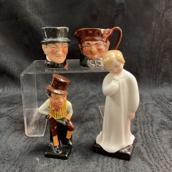 Royal Doulton character jugs featuring Sam Weller and Darling, vintage pottery.