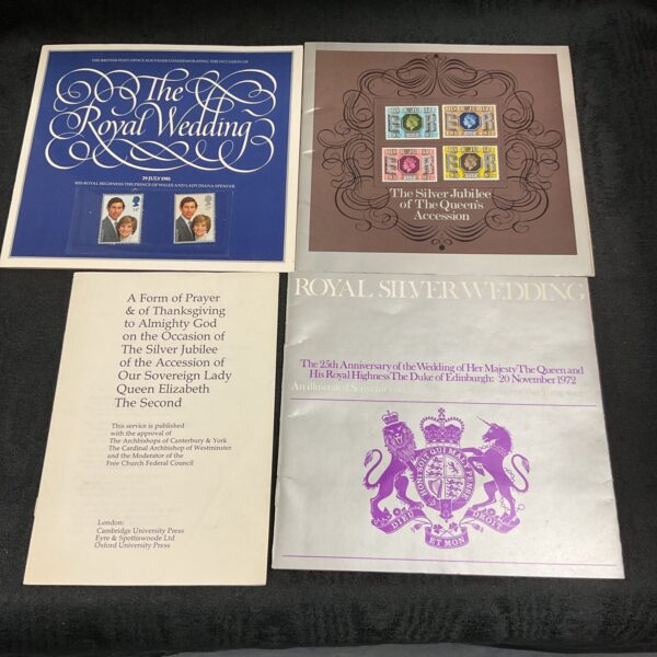 Front view of Royal Stamp Collection featuring Silver Jubilee and Charles and Diana stamps.