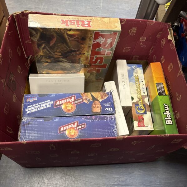 Sealed box of vintage board games including Risk and In for a Penny.