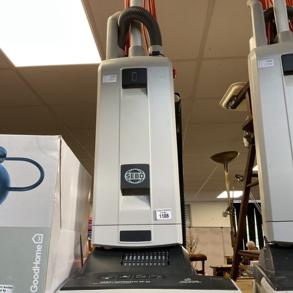 SEBO XP10 commercial upright vacuum cleaner in as-found condition.