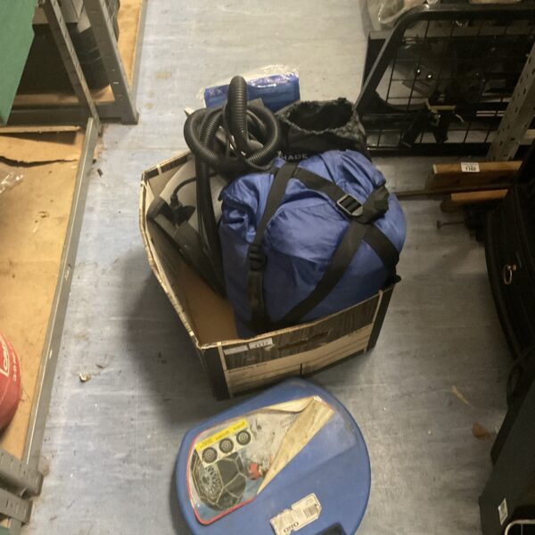 Shed clearance lot with sleeping bag and steamer visible.