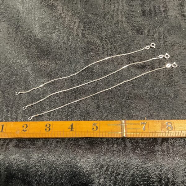 Lot of three delicate 925 silver chain bracelets.