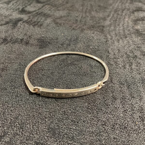 Delicate silver bracelet with crystal stones, elegant jewellery.