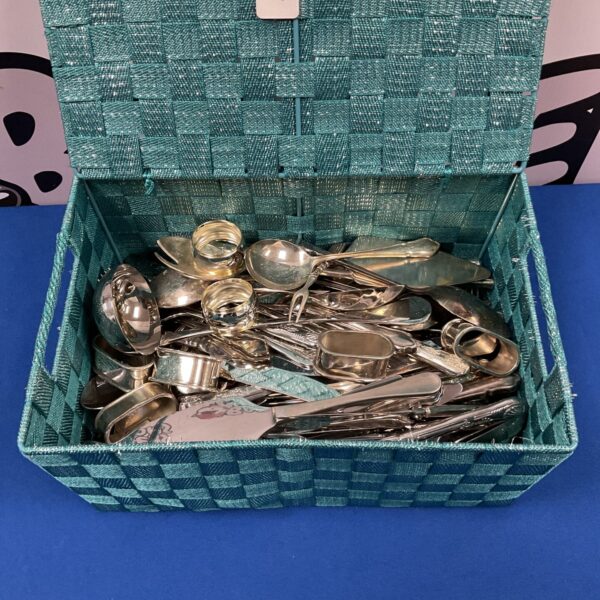 Silver plate cutlery basket with sia and Royal Doulton pieces.