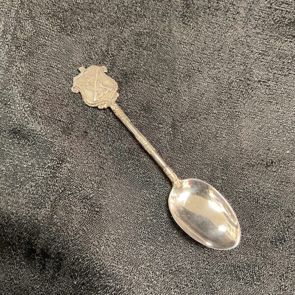 Antique silver shooting spoon with hallmarked handle.