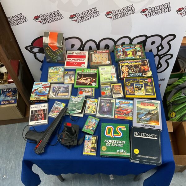 A lot of vintage Sinclair Spectrum game cassettes and accessories.