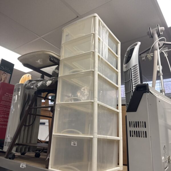 Six-tier plastic storage drawers cabinet for home organization.