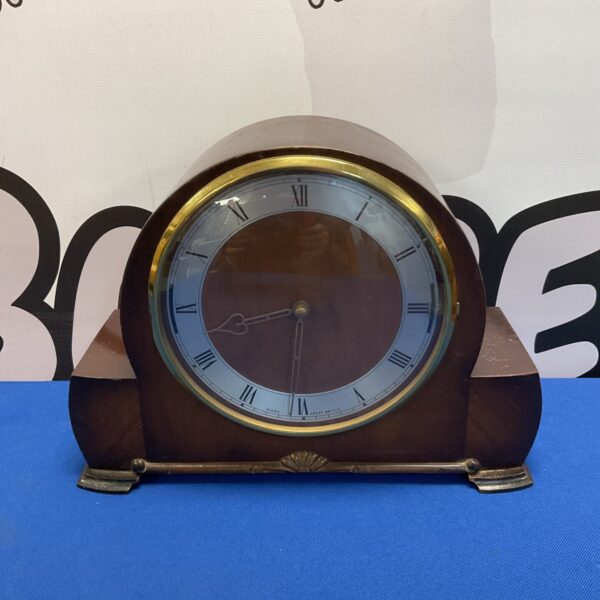 Vintage Smiths electric mantle clock with art deco styling.