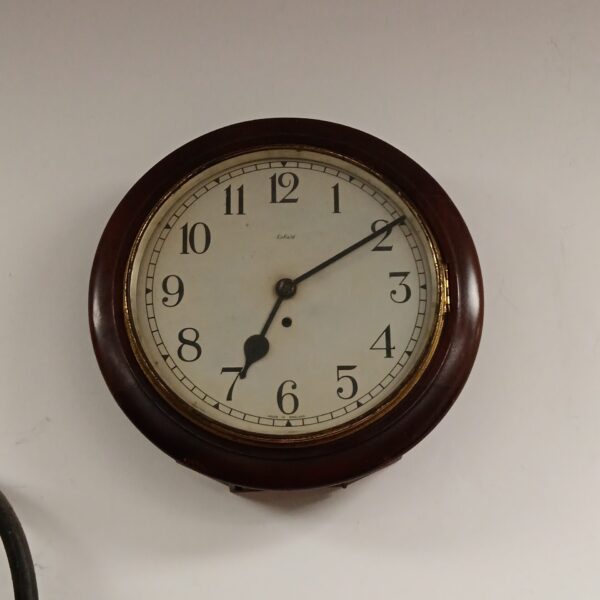 Vintage Smiths Enfield station clock with enamel face.