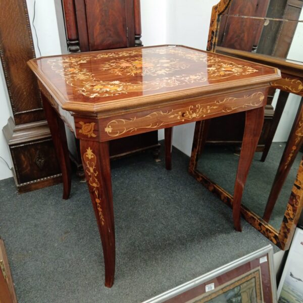 Antique Sorrento inlaid games table with detailed marquetry.