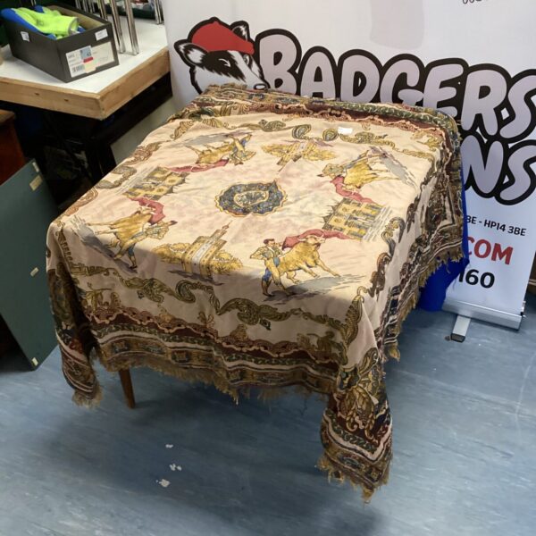 Vintage Spanish matador tablecloth with bullfighting scene.