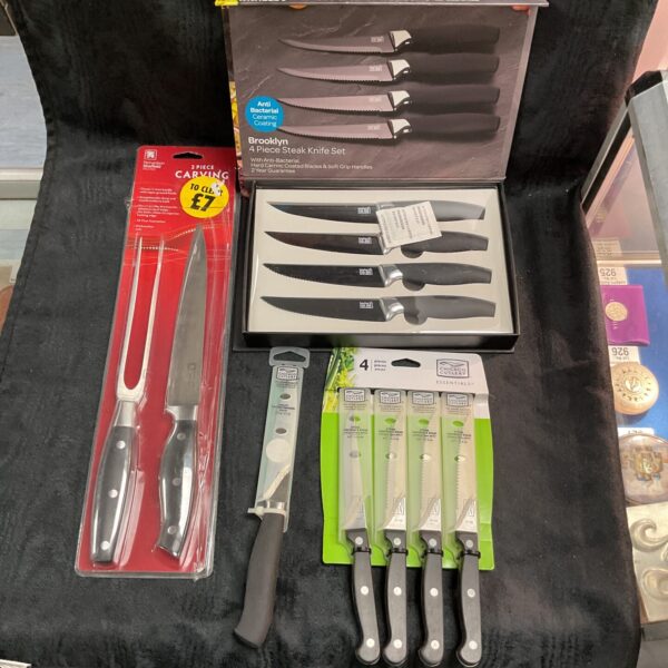 New steak knife set in original packaging, kitchen cutlery.