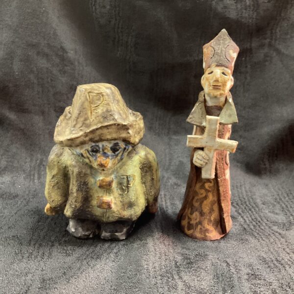 Vintage studio pottery Paddington Bear and Archbishop figurines.