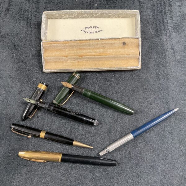 Vintage Swan pen collection with fountain pens and pencil.