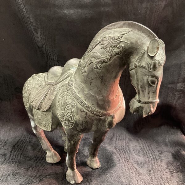 Front view of vintage Tang Dynasty style horse statue.