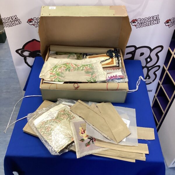 Vintage tapestry craft lot with wall hangings and supplies.