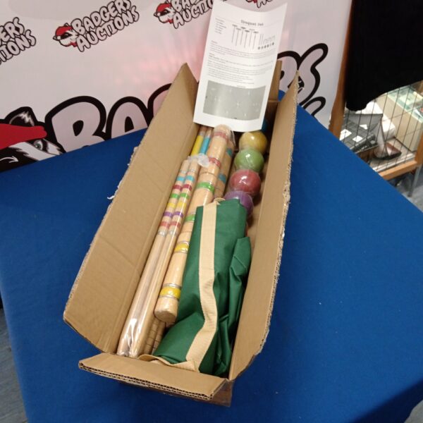 Taylor brown croquet set inside original packaging.