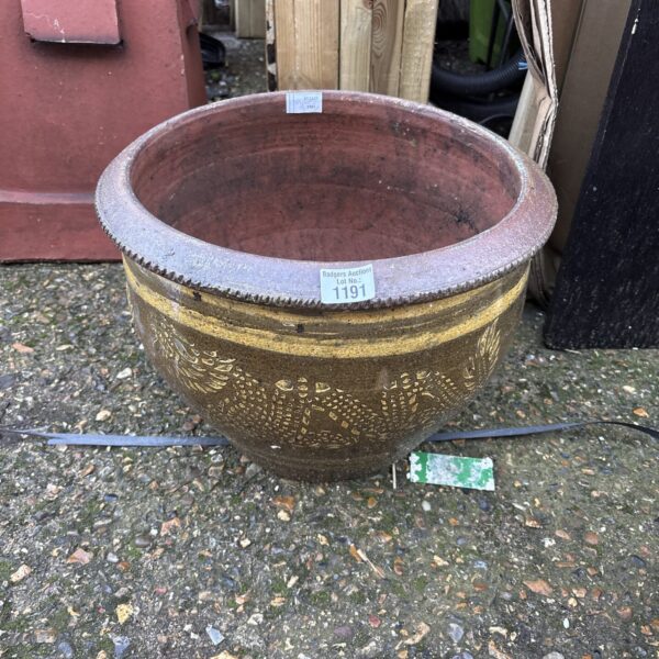 Large terracotta garden planter in Chinese style for outdoor use.