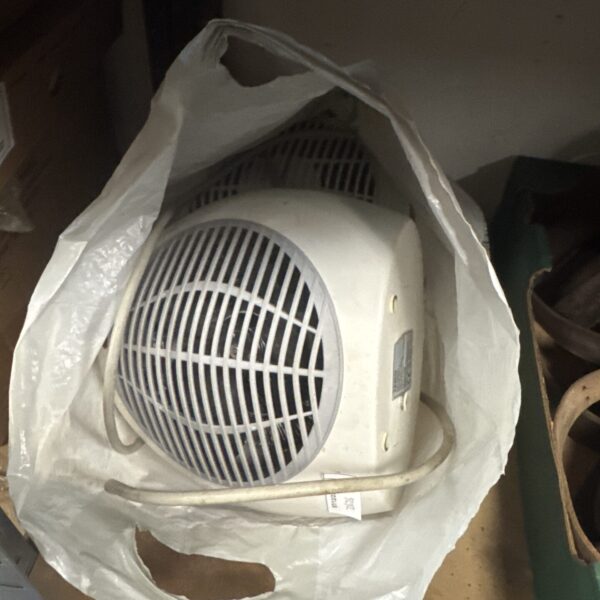 Front view of a small Tesco electric fan heater.