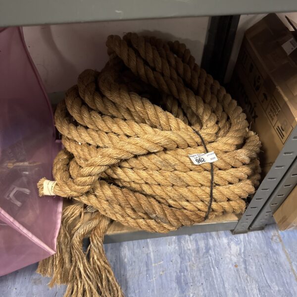 Coiled thick rope, a heavy duty natural fibre rope.