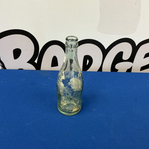 Antique Thompson of High Wycombe embossed glass bottle.