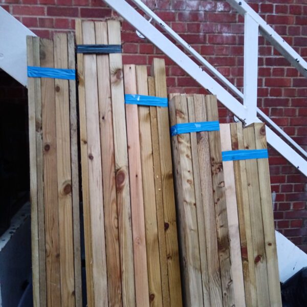 Stack of timber bundles ready for construction or DIY projects.