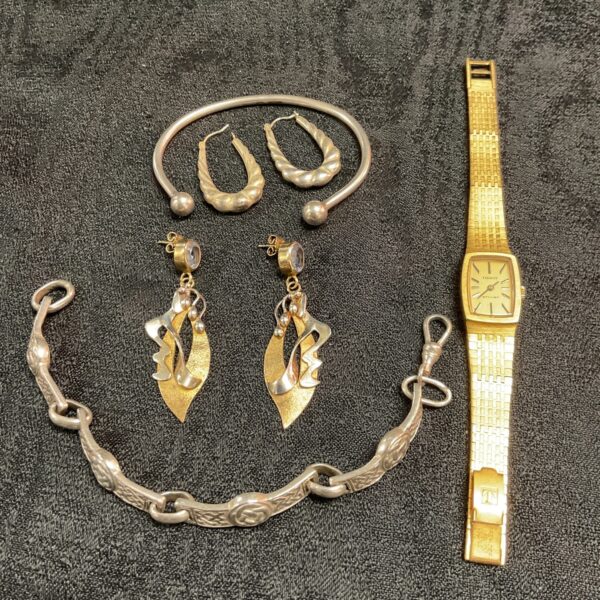 Vintage Tisdot Stylist ladies watch within a jewellery lot.